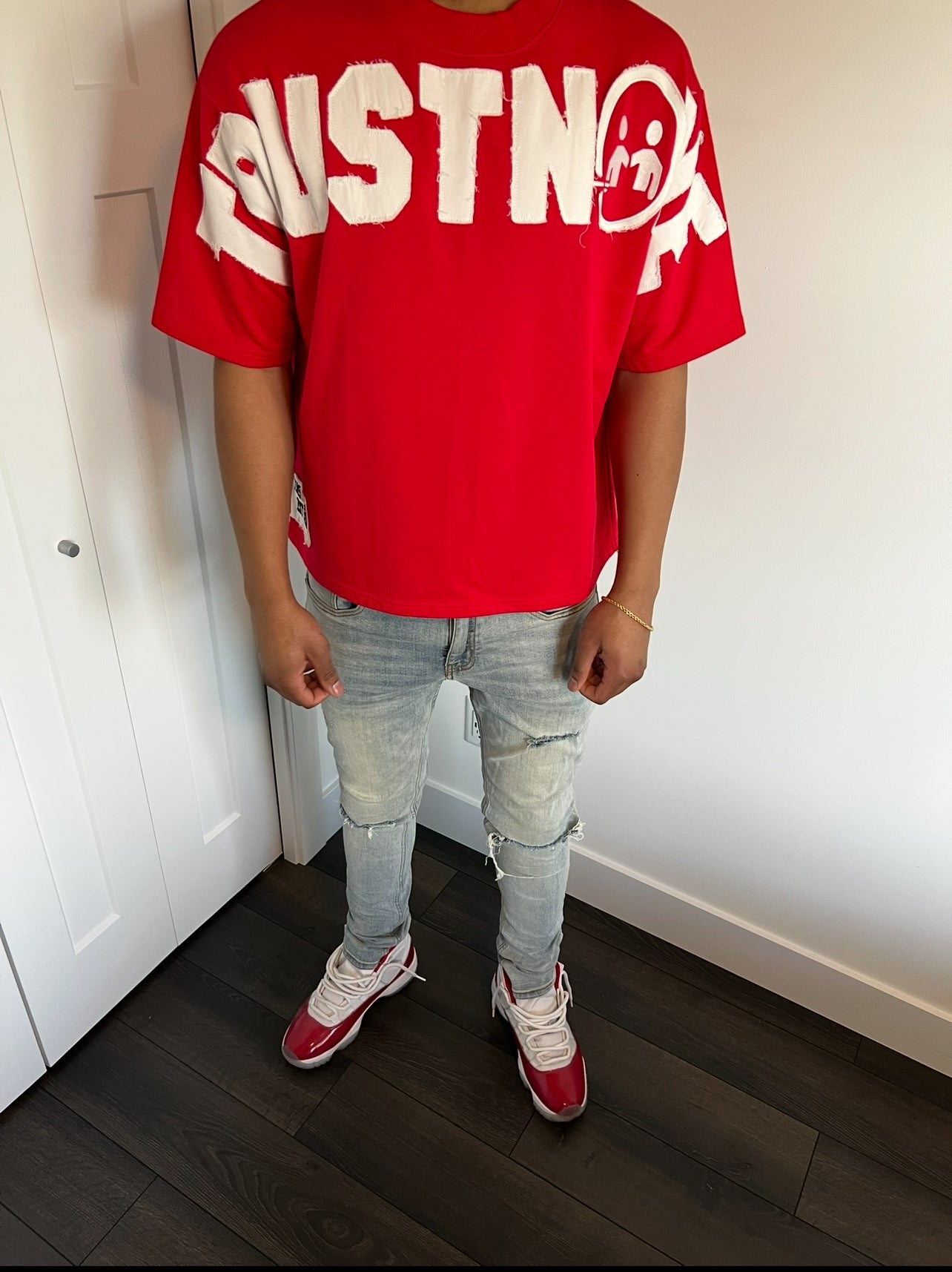 “Trustnone” Red distressed Oversized Tee