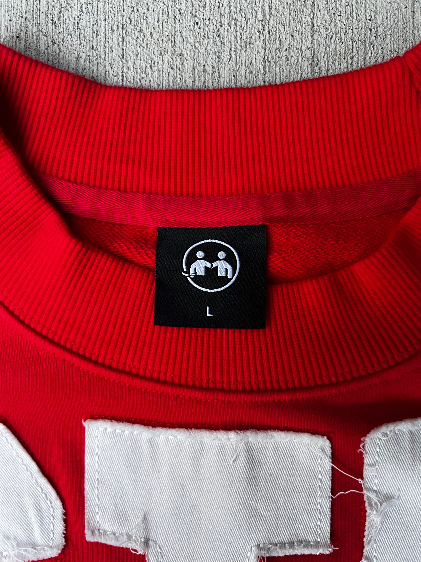 “Trustnone” Red distressed Oversized Tee